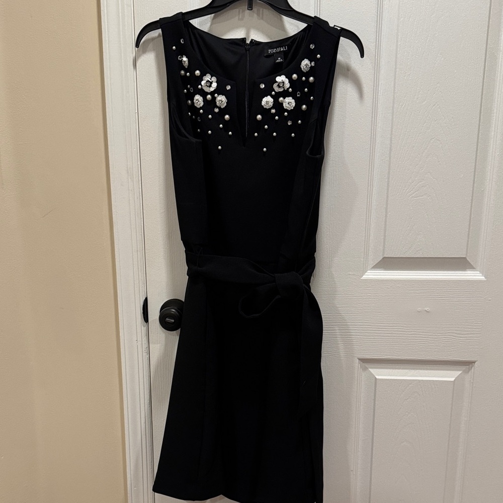 Chic Black Mini Dress with White Floral Accents